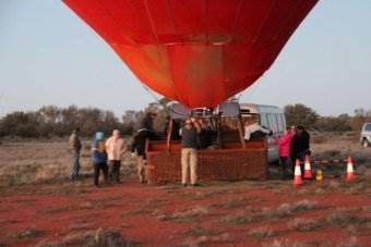 The scarf was sucked into the blower, and the Sydney woman died six years ago in the Alice Springs hot-air balloon. The Supreme Court finally ruled.