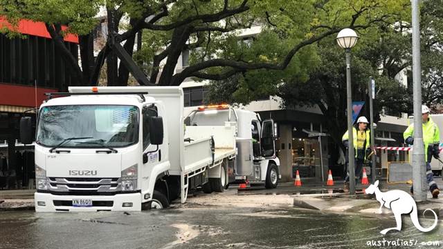 Sydney was hit by heavy rain, washed out roads, homes were cut off