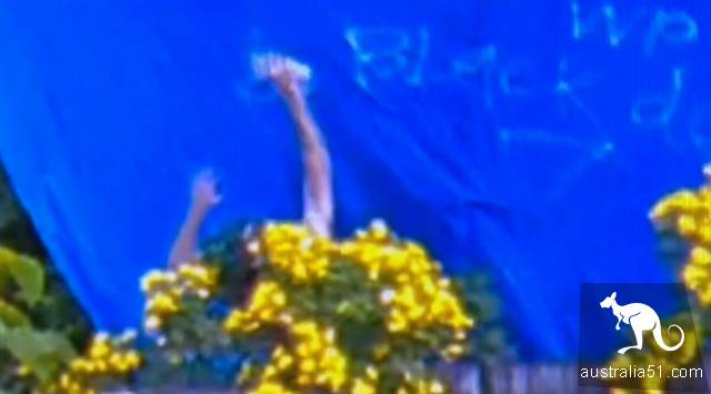 Kunzhou man was caught spraying discriminatory slogans in a neighbor's house.